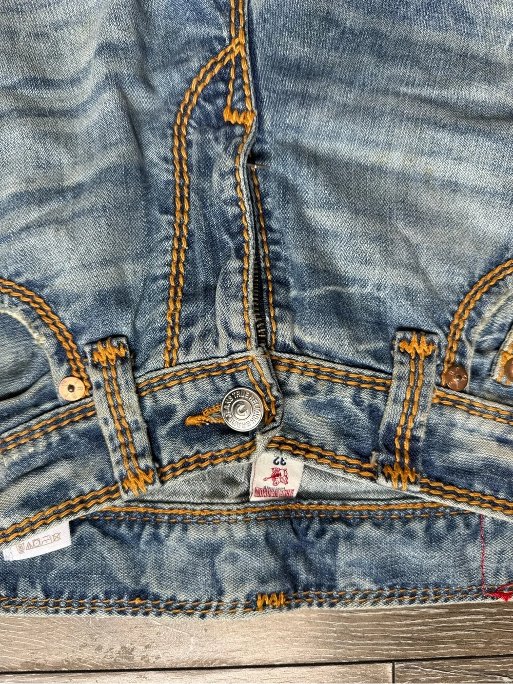True Religion Light Wash Denim Shorts with Orange Topstitching